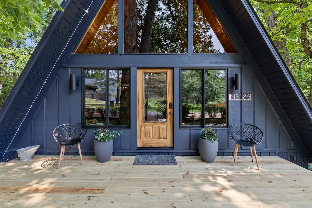 blue a-frame in the woods