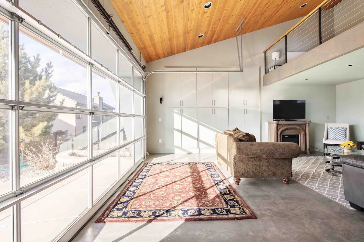 airbnb bedroom with garage doors