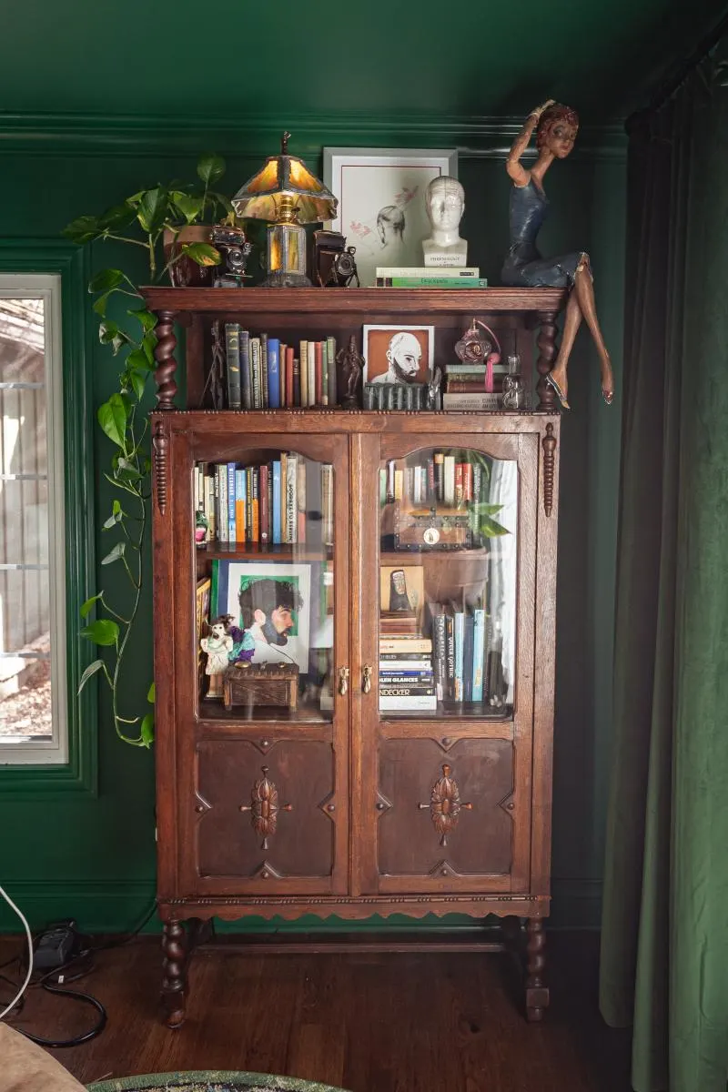 bookshelf in green room